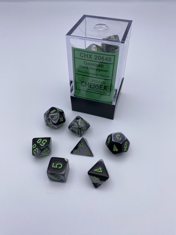 Chessex - Gemini® Mini-Polyhedral Black-Grey/green 7-Die Set